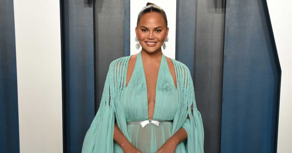 Chrissy Teigen talks about her breast implant removal.